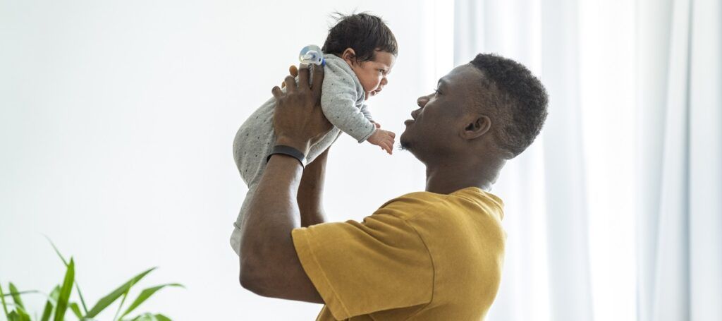 Father holding baby