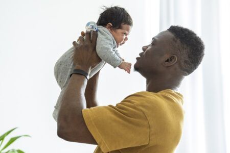 Father holding baby