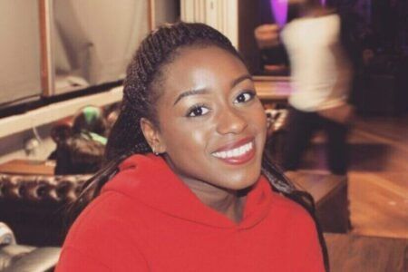 Unitemps candidate Christianah Babajide on campus at City University of London smiling