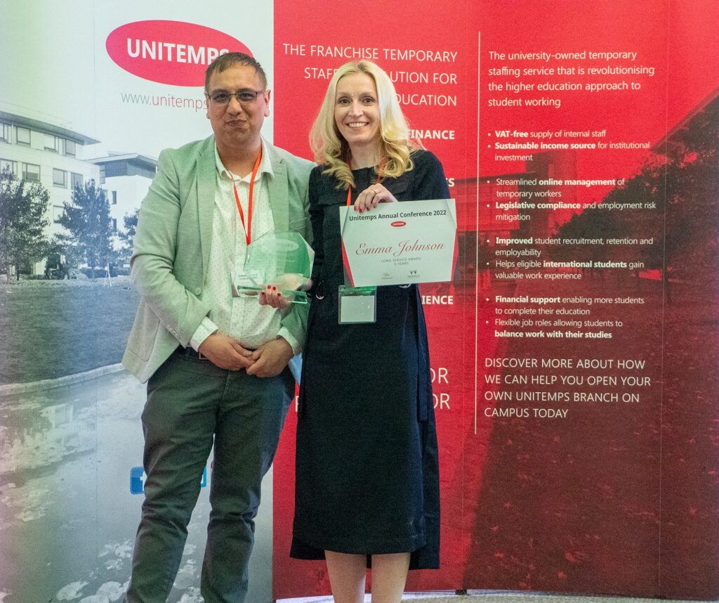 Unitemps staff member Emma Johnson receiving award