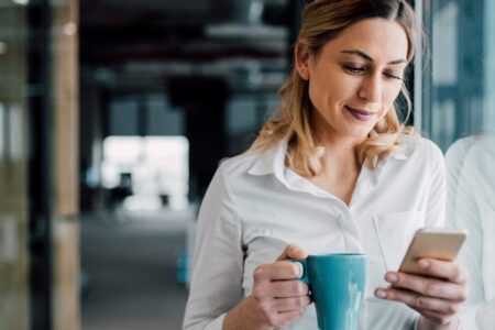 Woman at working using social media