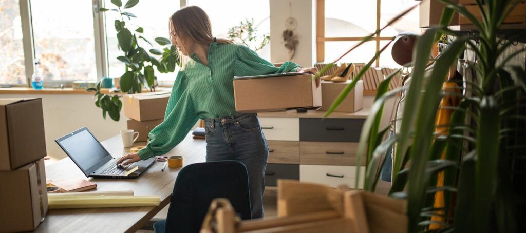 woman packing her desk