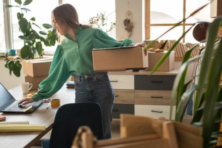 woman packing her desk